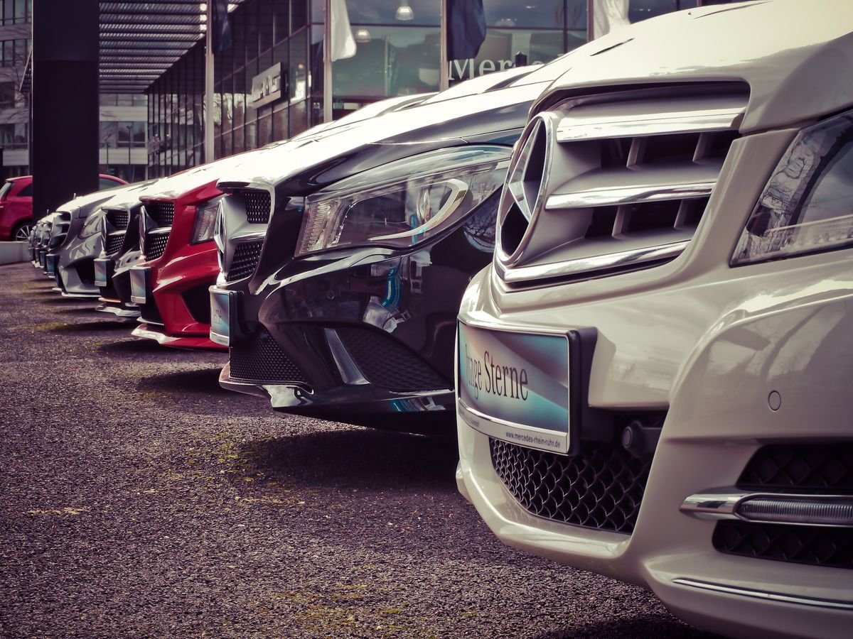 Row of parked vehicles on a sales lot