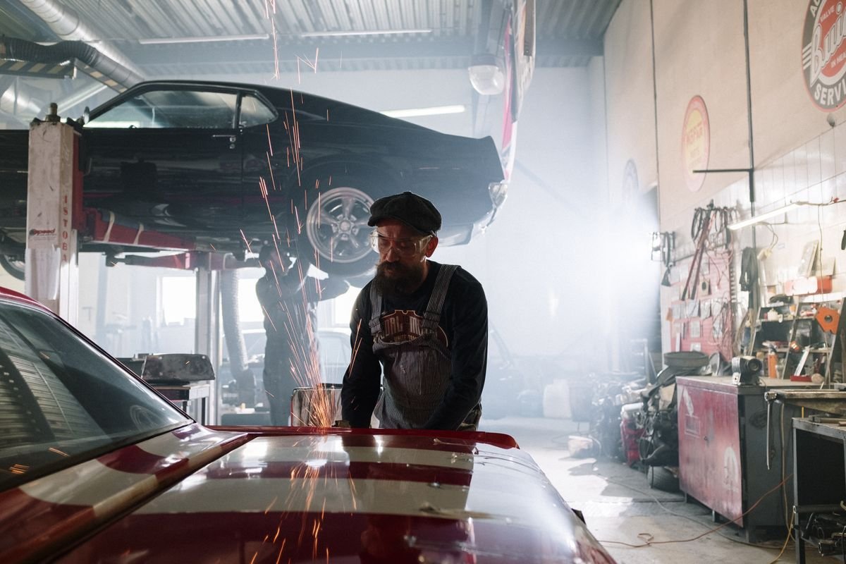 Vehicle raised inside a repair shop service bay
