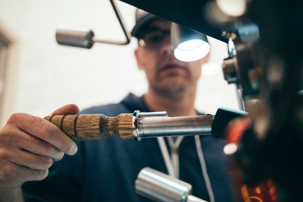 Technician performing metalwork with visible sparks