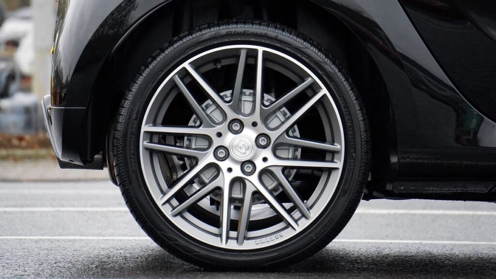 Close view of an alloy wheel and brake caliper